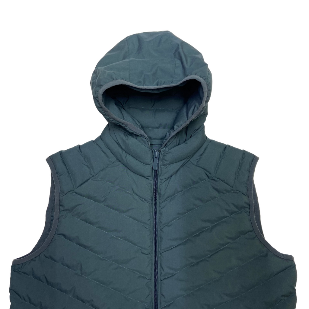Grey (in dark blue shade) quilted gillet jacket with a hood on a white background