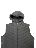 Gray puffer vest with a hood on a white background